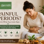Woman experiencing painful menstrual cramps holding her abdomen, with Ayurvedic herbs and tea shown as natural remedies for period pain relief.